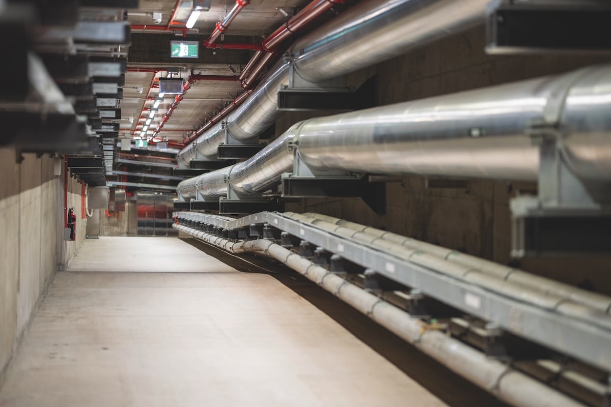 The 240m services tunnel carries critical infrastructure between the existing A01 building and the new A40 facility.